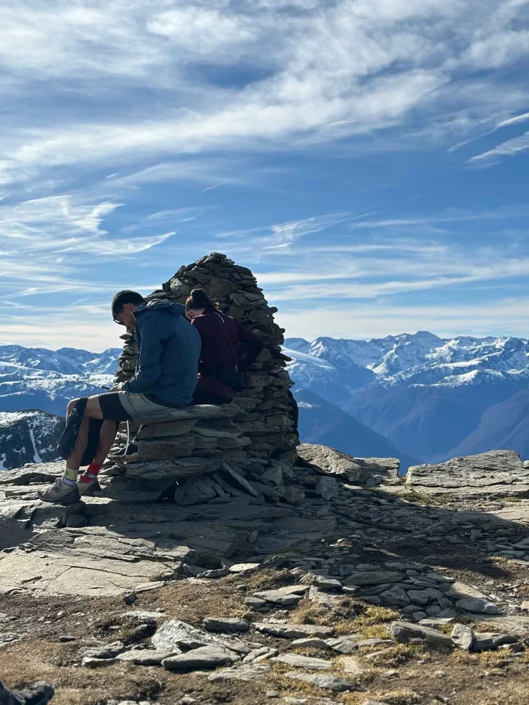 Hikers' break at the summit of Mont Fourcat